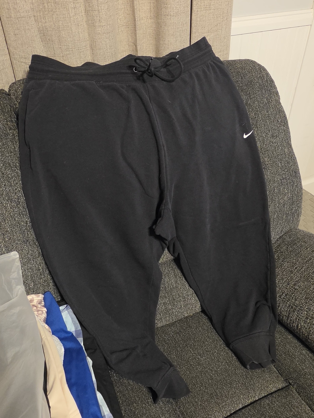 Nike Kids Black Jogger Sweatpants with Small White Swoosh